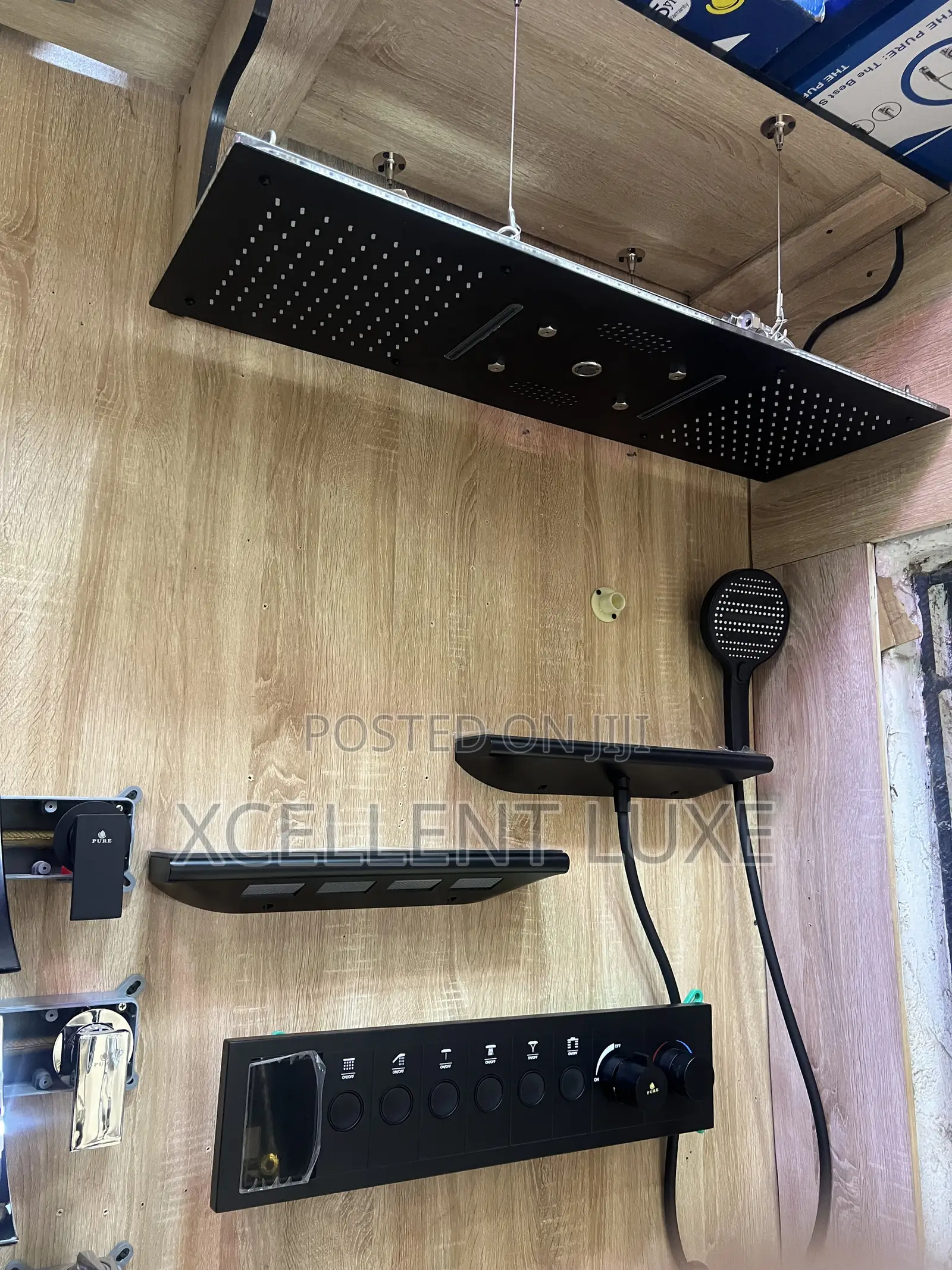 Conduit Shower Mixer With Ceiling Mount Shower Head and Shoulder Jets.