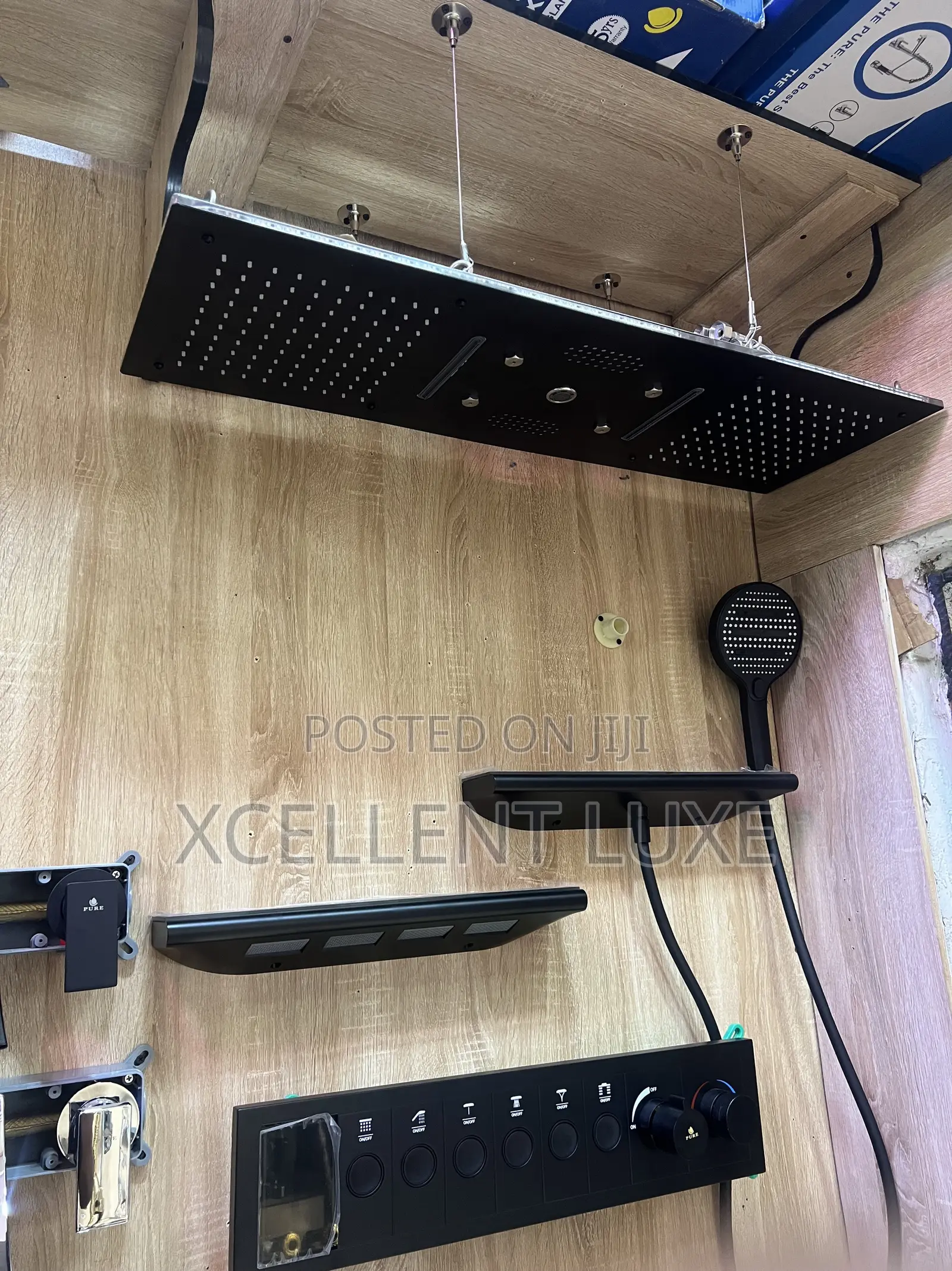 Conduit Shower Mixer With Ceiling Mount Shower Head and Shoulder Jets.
