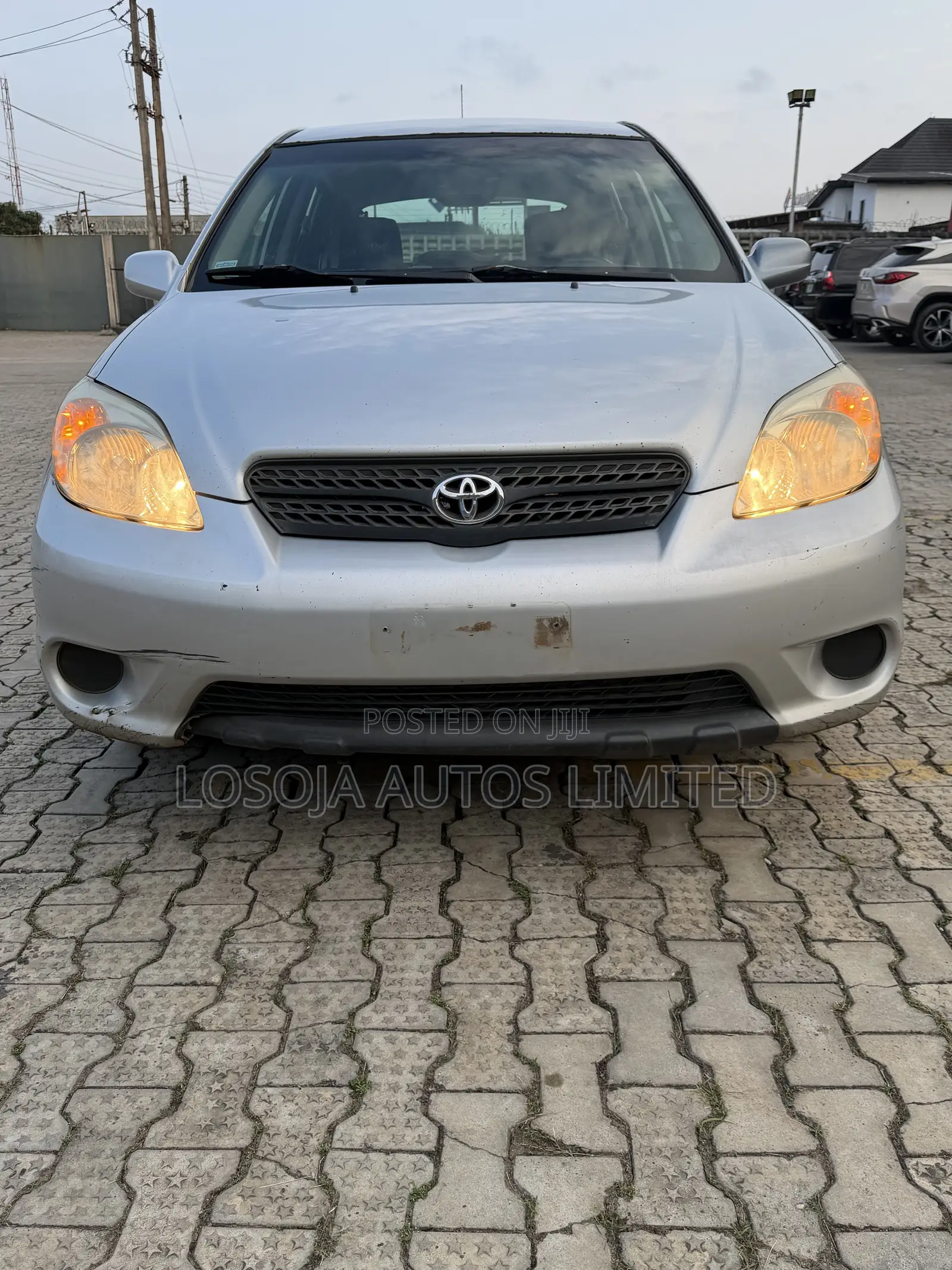 Toyota Matrix XR Hatchback FWD (1.8L 4cyl 4A) 2005 Red