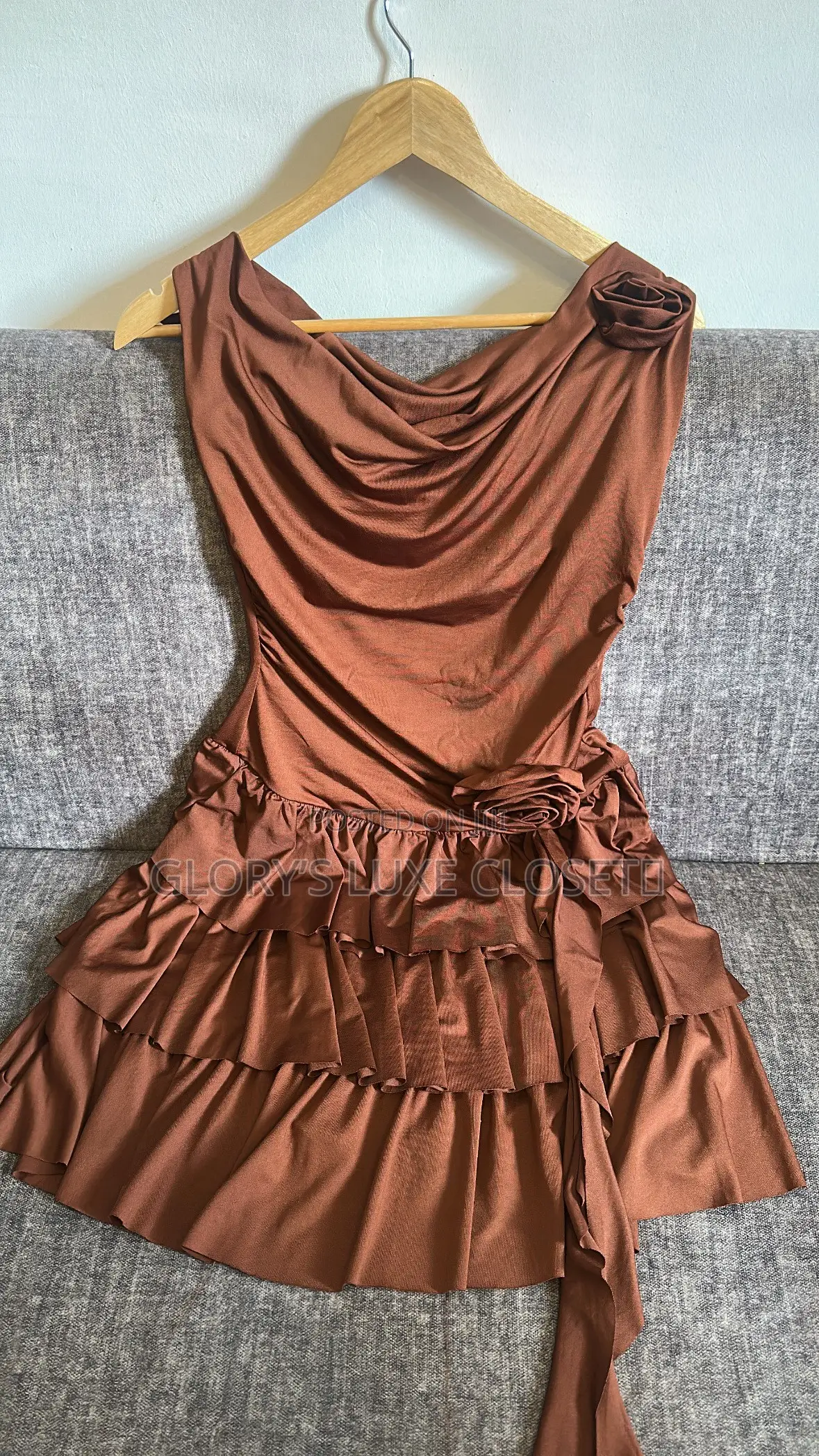 Rosette Cowl-Neck Tiered Mini Dress.”