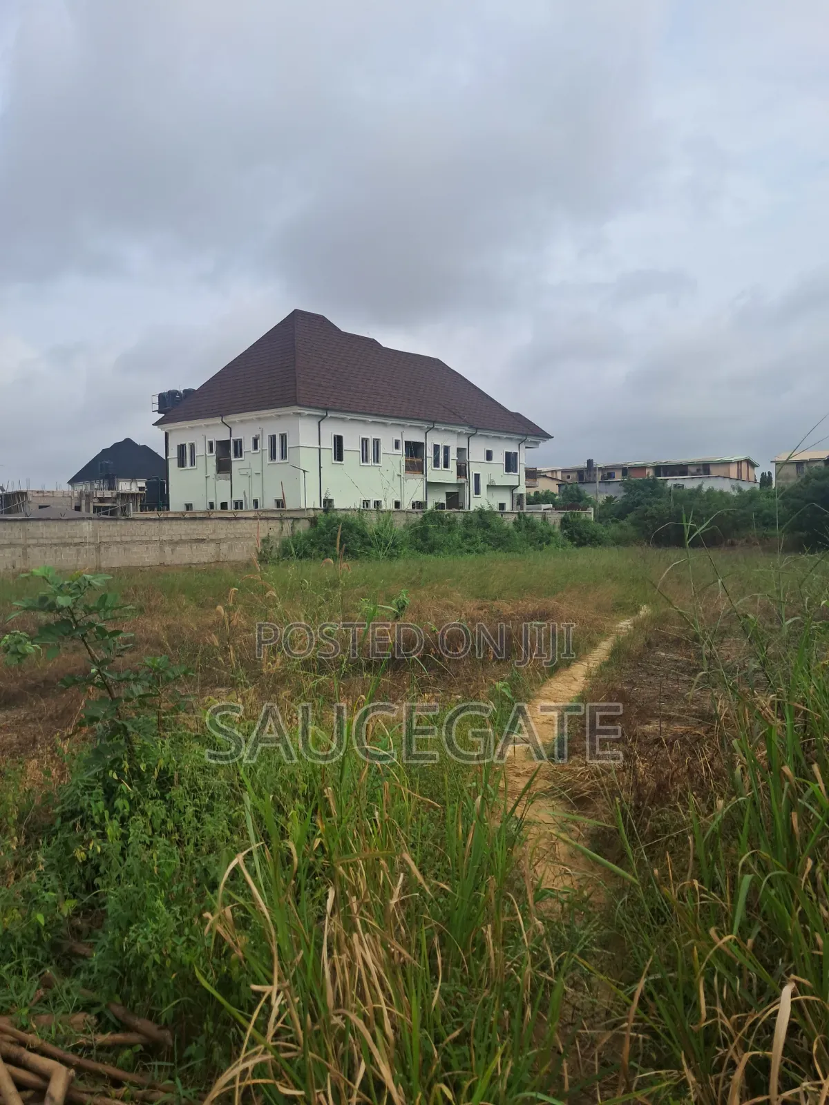 Dry Land at SatelliteTown Nasxo Estate Global C of O No Omonile