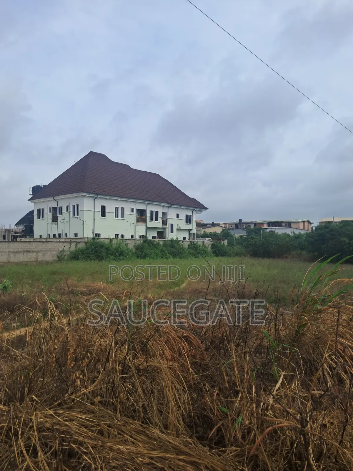 Dry Land at SatelliteTown Nasxo Estate Global C of O No Omonile