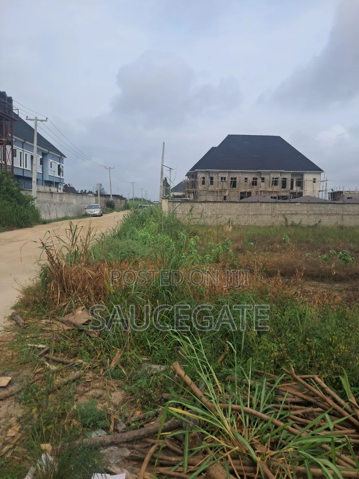 Dry Land at SatelliteTown Nasxo Estate Global C of O No Omonile