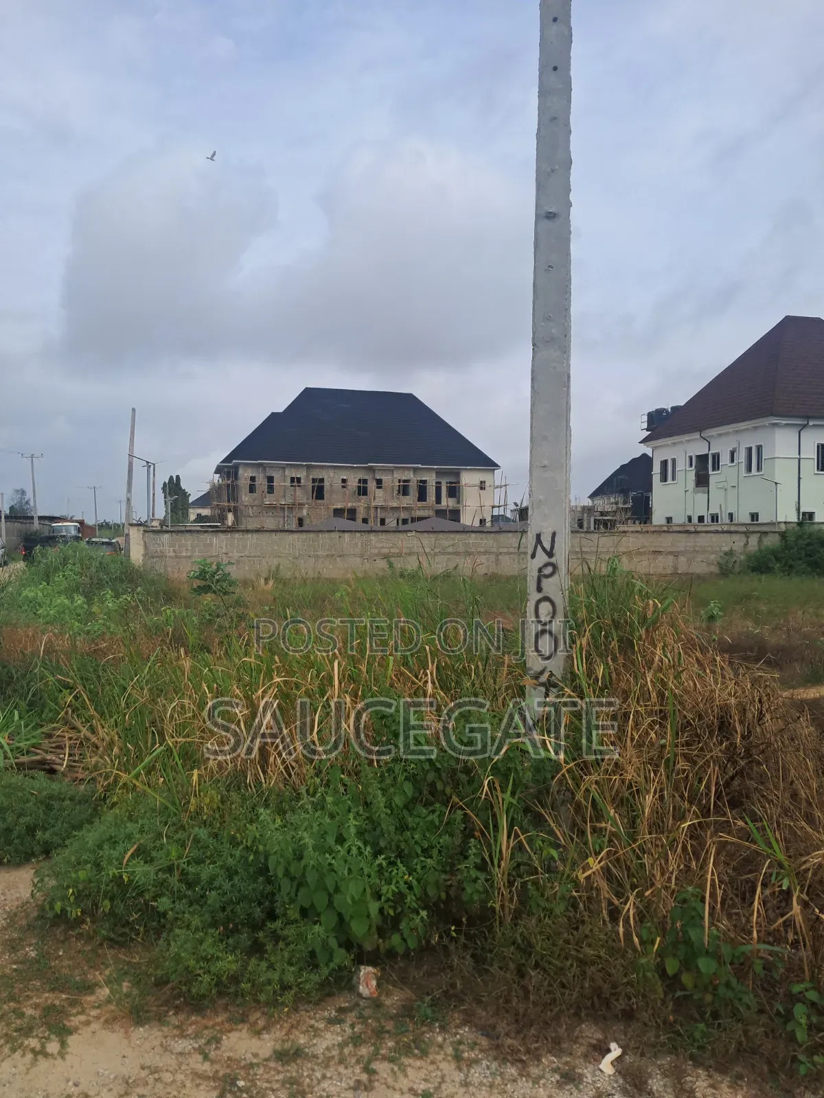 Dry Land at SatelliteTown Nasxo Estate Global C of O No Omonile