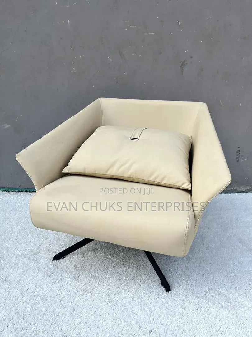 Swivel Arm Chair Available