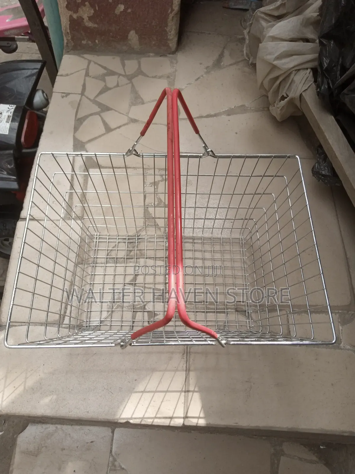Hand Holding Grocery Basket