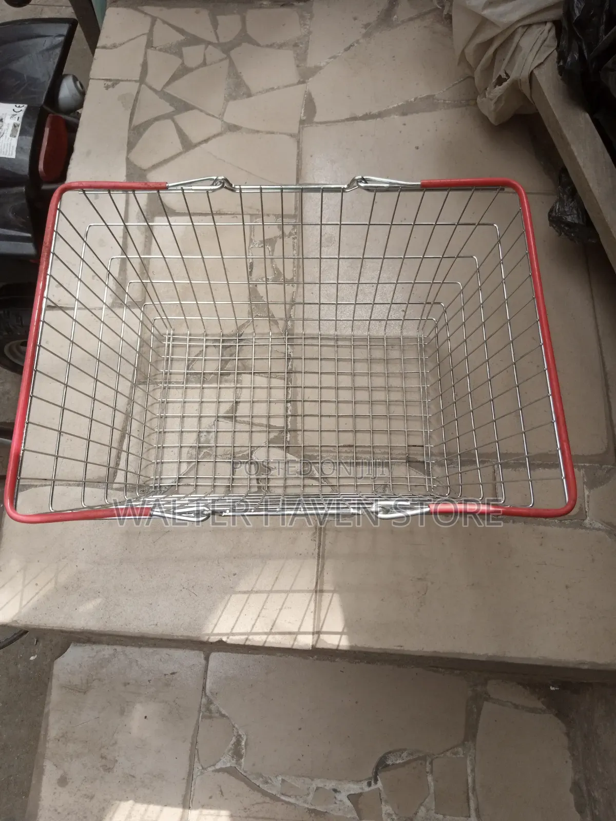 Hand Holding Grocery Basket