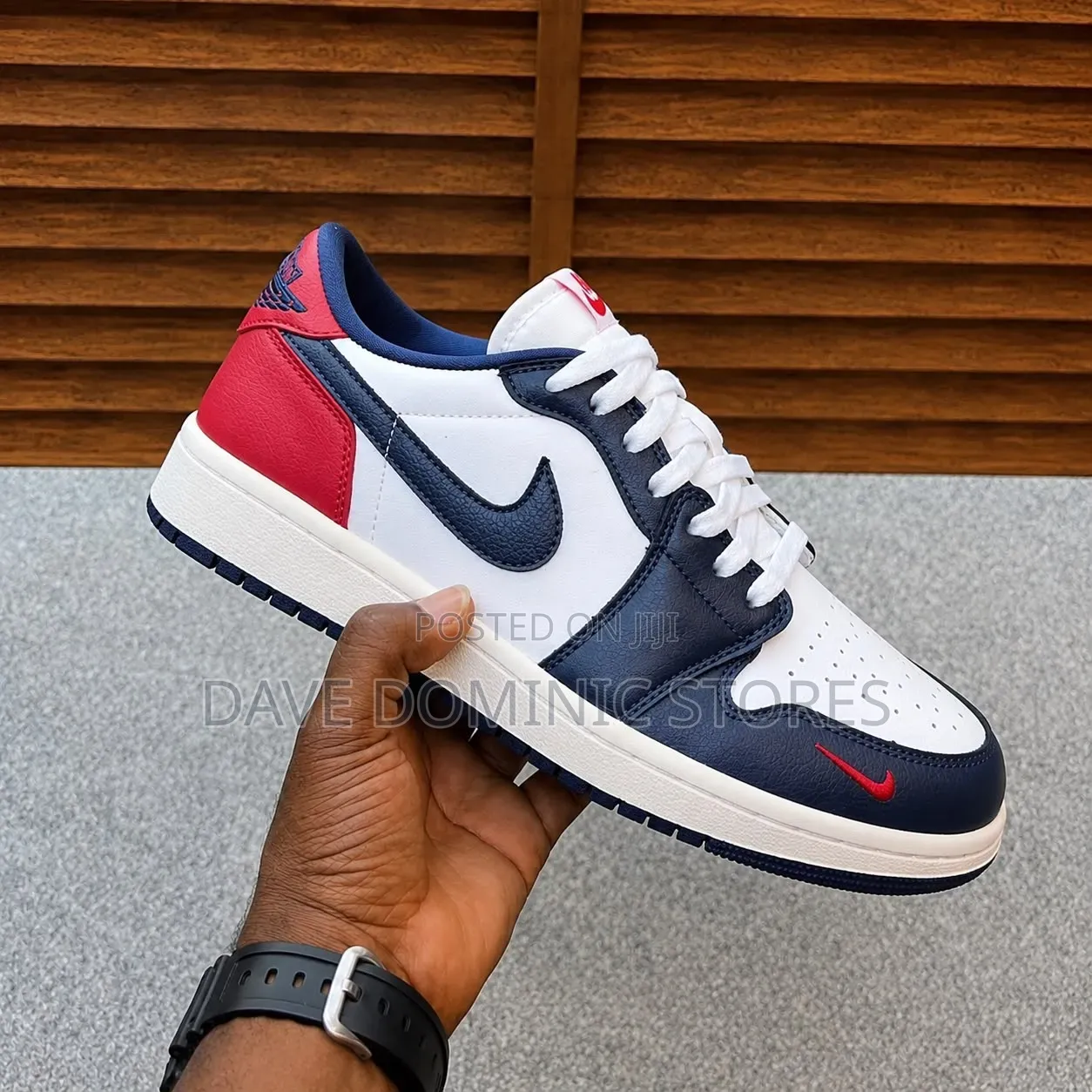 Original Nike Air Jordan 1 Low in a White/Navy/Red Colourway.