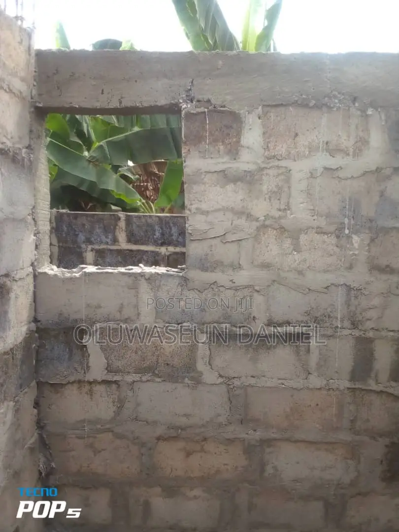 Uncompleted Building on Half Plot of Land