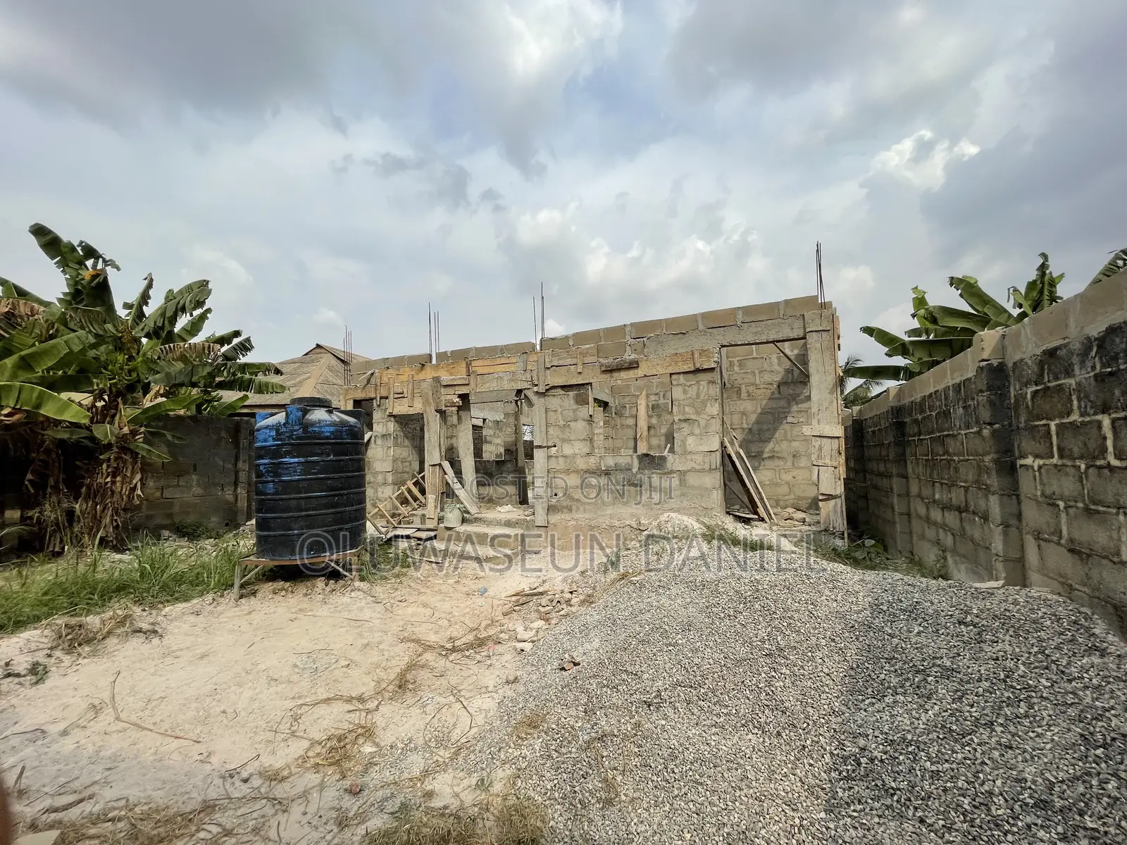 Uncompleted Building on Half Plot of Land