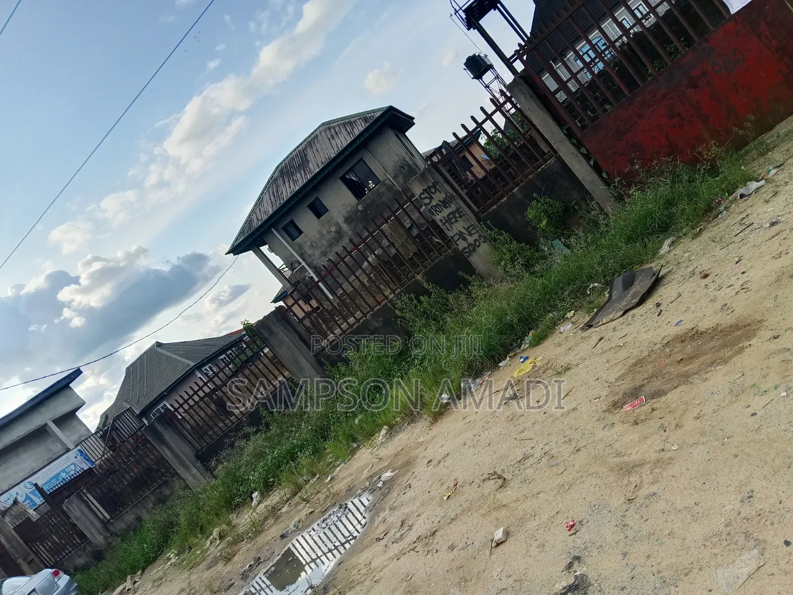 A Plot of Land for Sale Along the Road