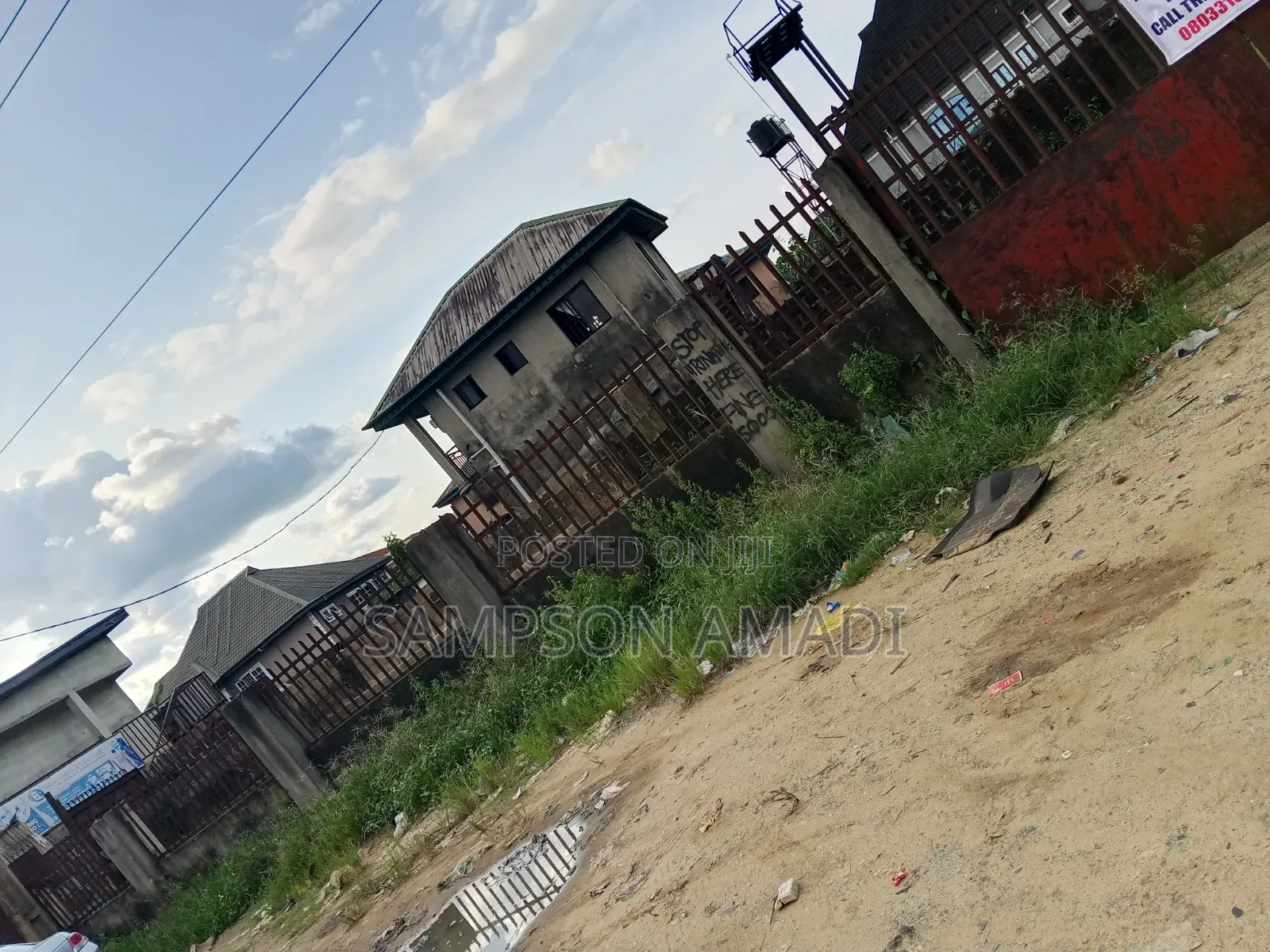 A Plot of Land for Sale Along the Road