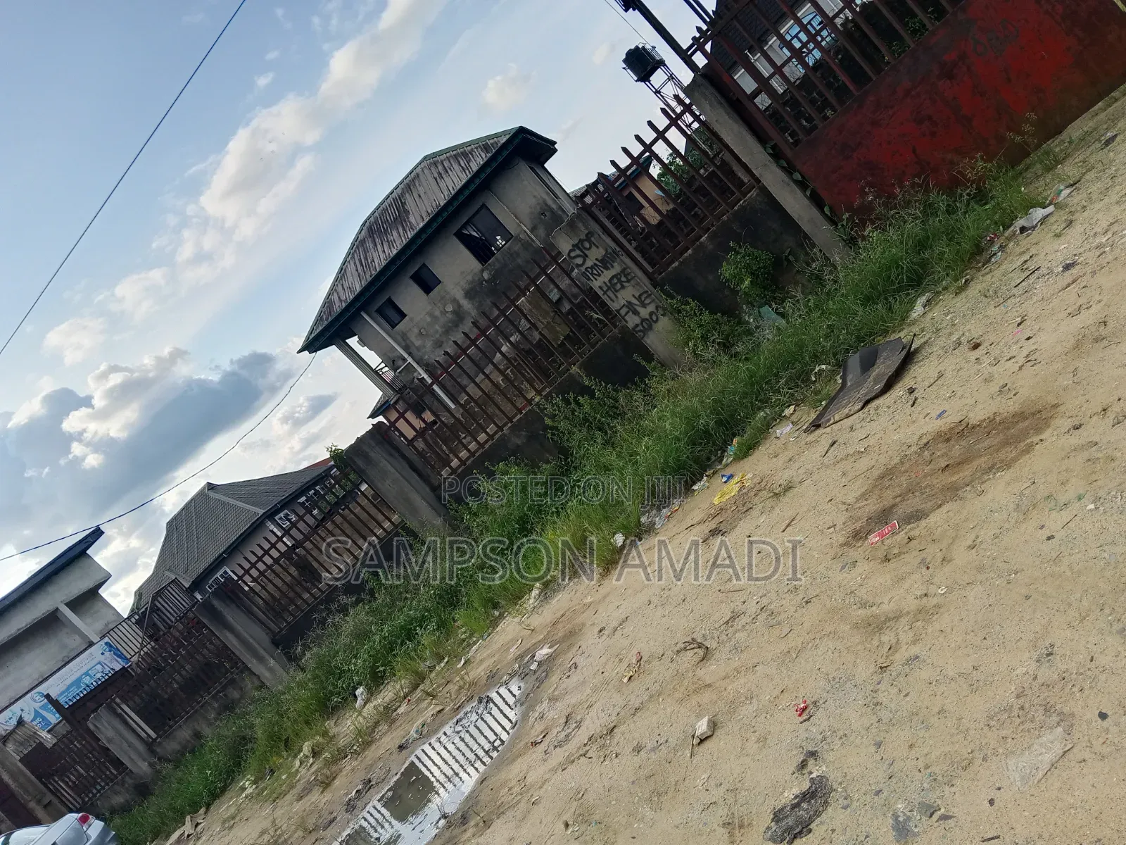 A Plot of Land for Sale Along the Road