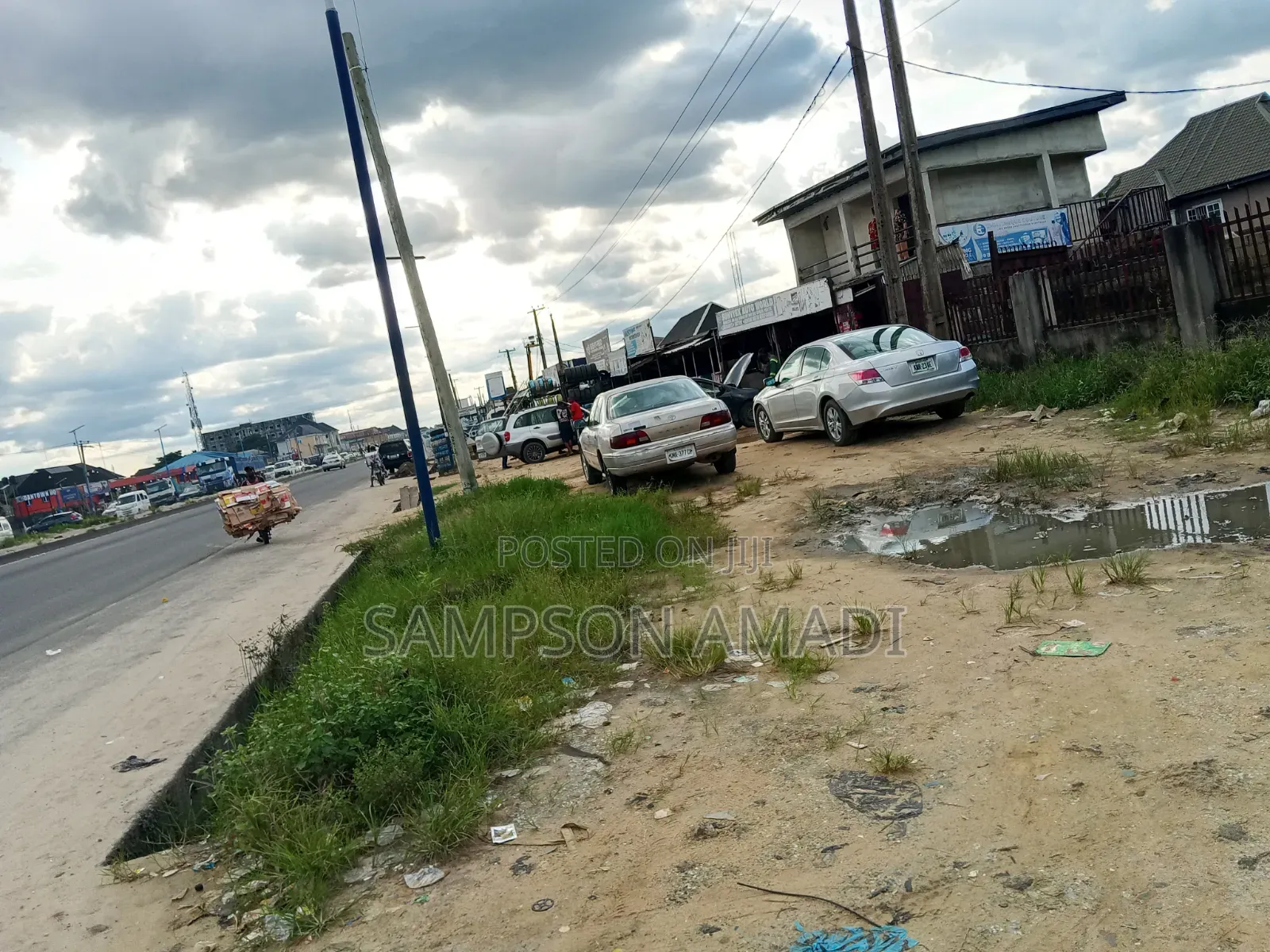 A Plot of Land for Sale Along the Road