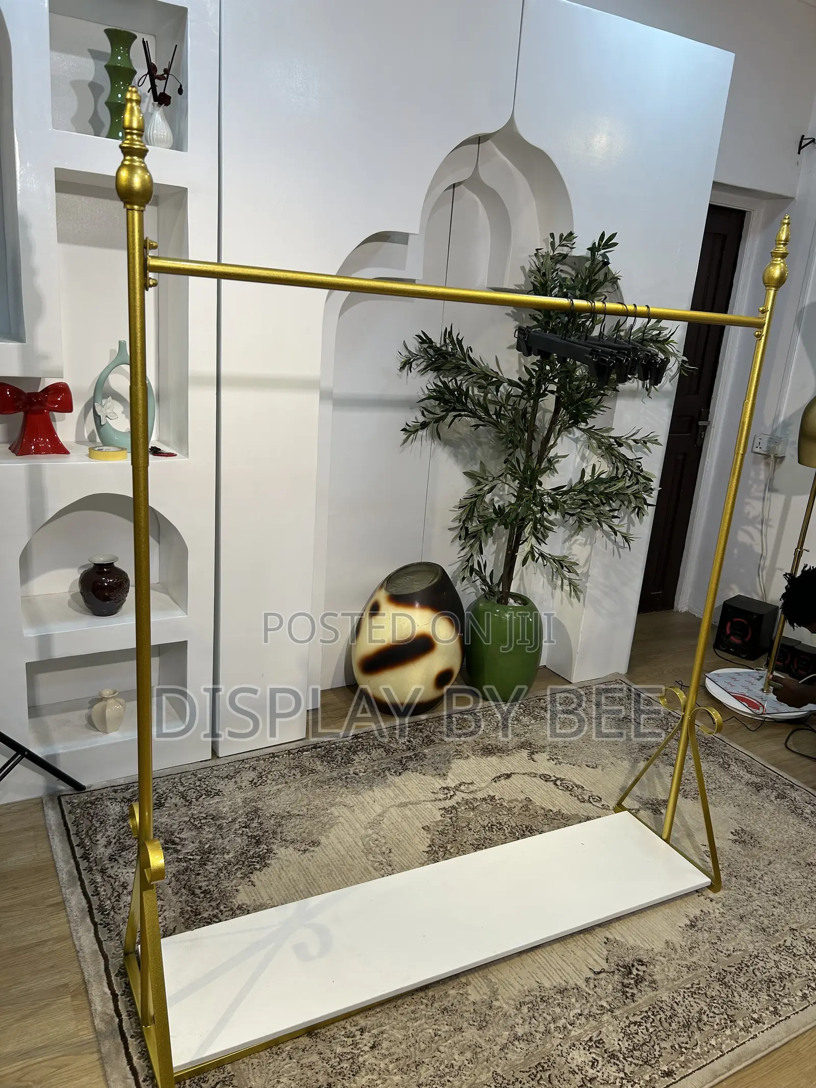 Gold Clothes Display Rack With Base | Boutique Store Rack