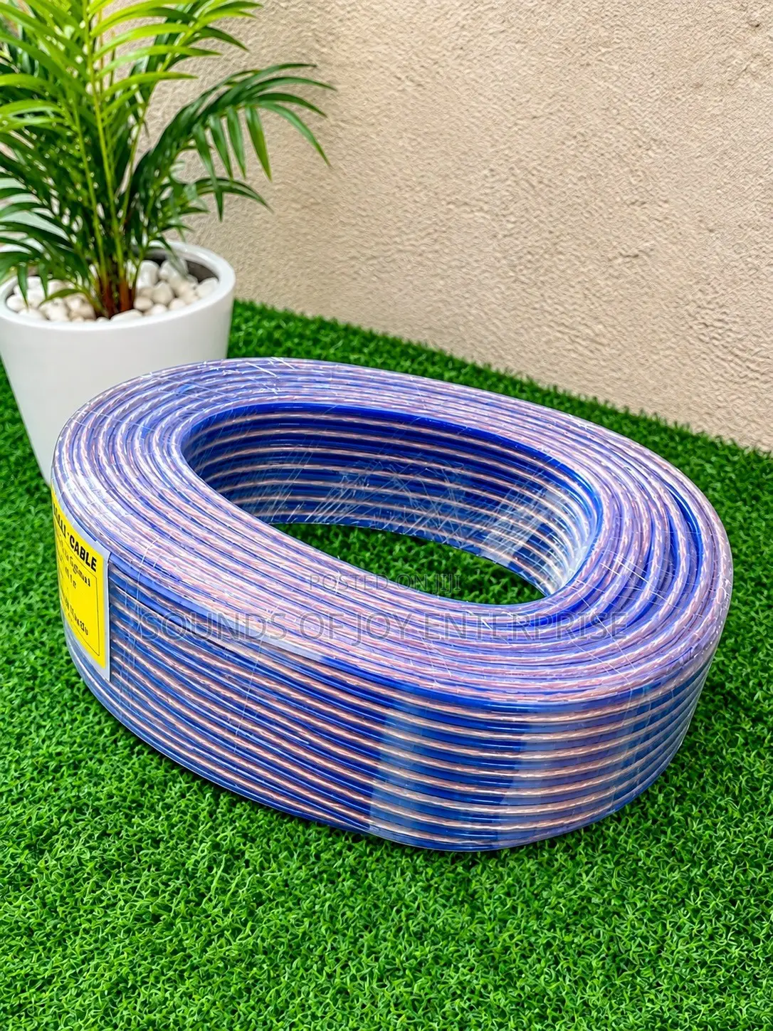 A Roll of Blue and White Transparent Wire