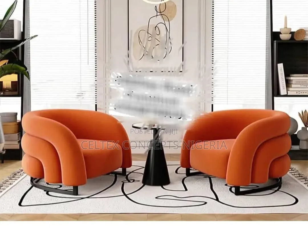 A Modern Orange Curved Accent Chair