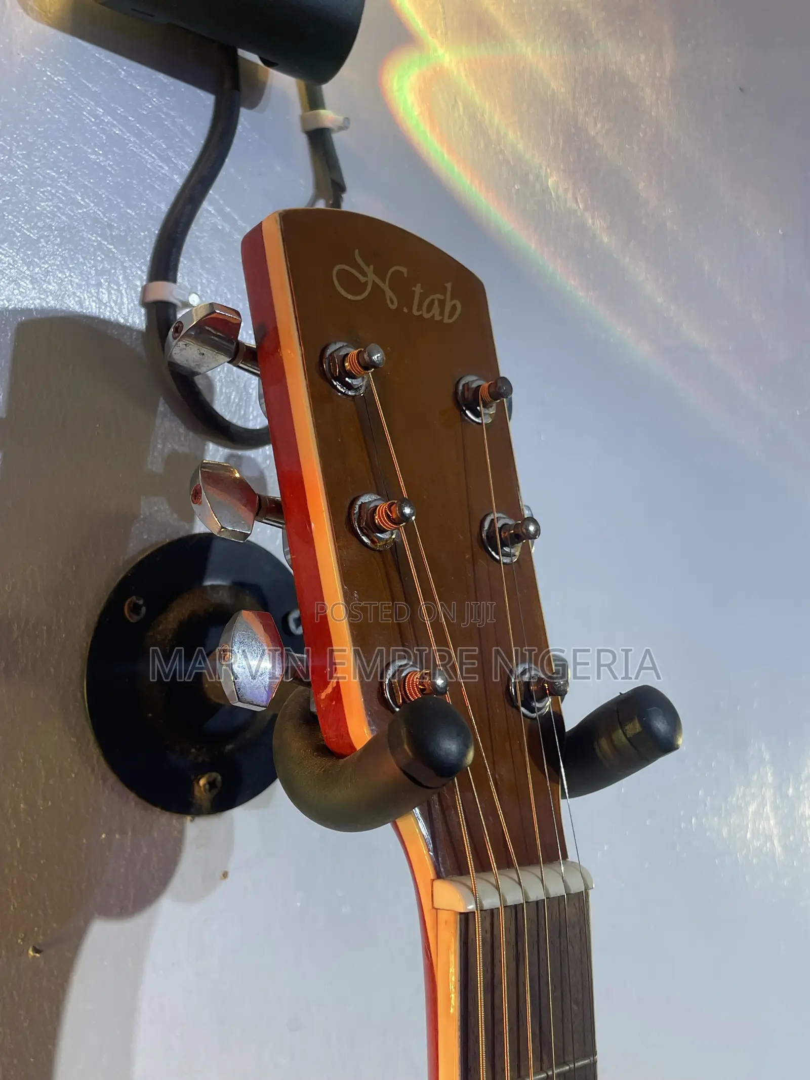 A Natural-Finish Dreadnought Acoustic Guitar With Bag