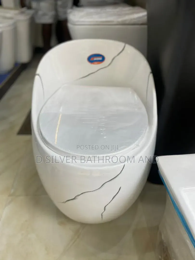 Quality Luxury Egg-Shape Water Closet – Modern White Marble Design