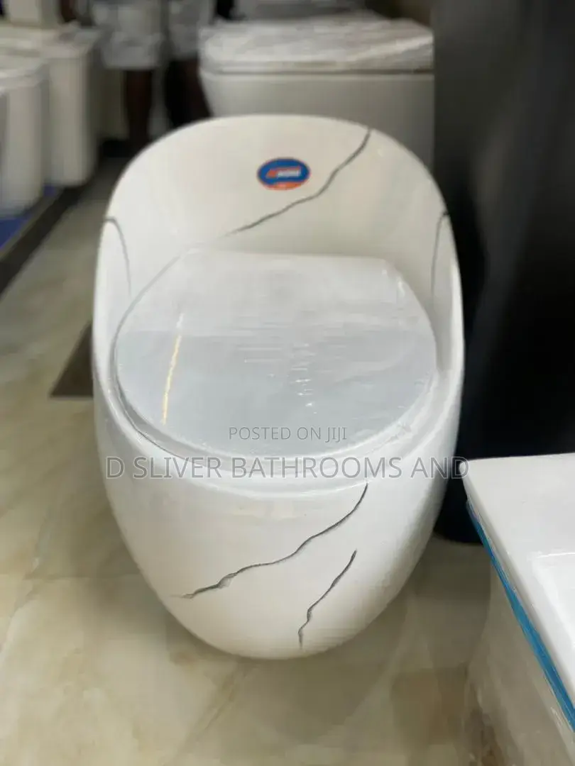 Quality Luxury Egg-Shape Water Closet – Modern White Marble Design