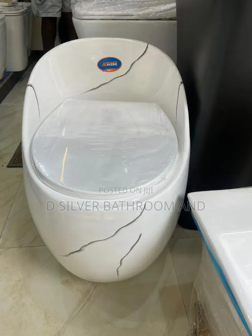 Quality Luxury Egg-Shape Water Closet – Modern White Marble Design