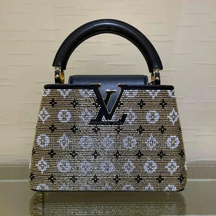 LouisVuitton Monogram Capucines
Comes in Displayed Size: Mini