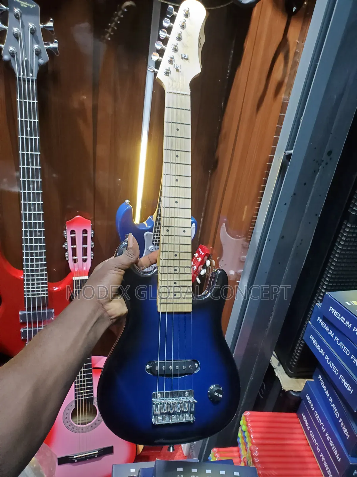 Blue 30-Inch Mini Electric Guitar.