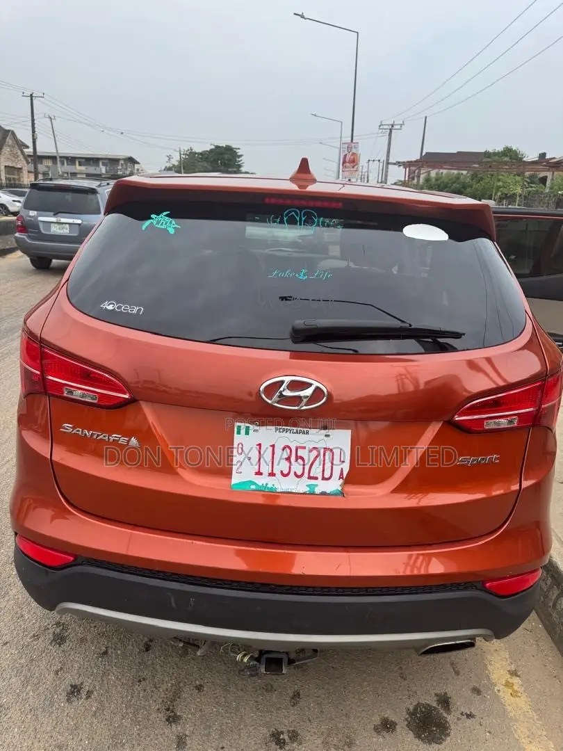 Hyundai Santa Fe GLS 4dr SUV AWD (3.3L 6cyl 6A) 2015 Orange