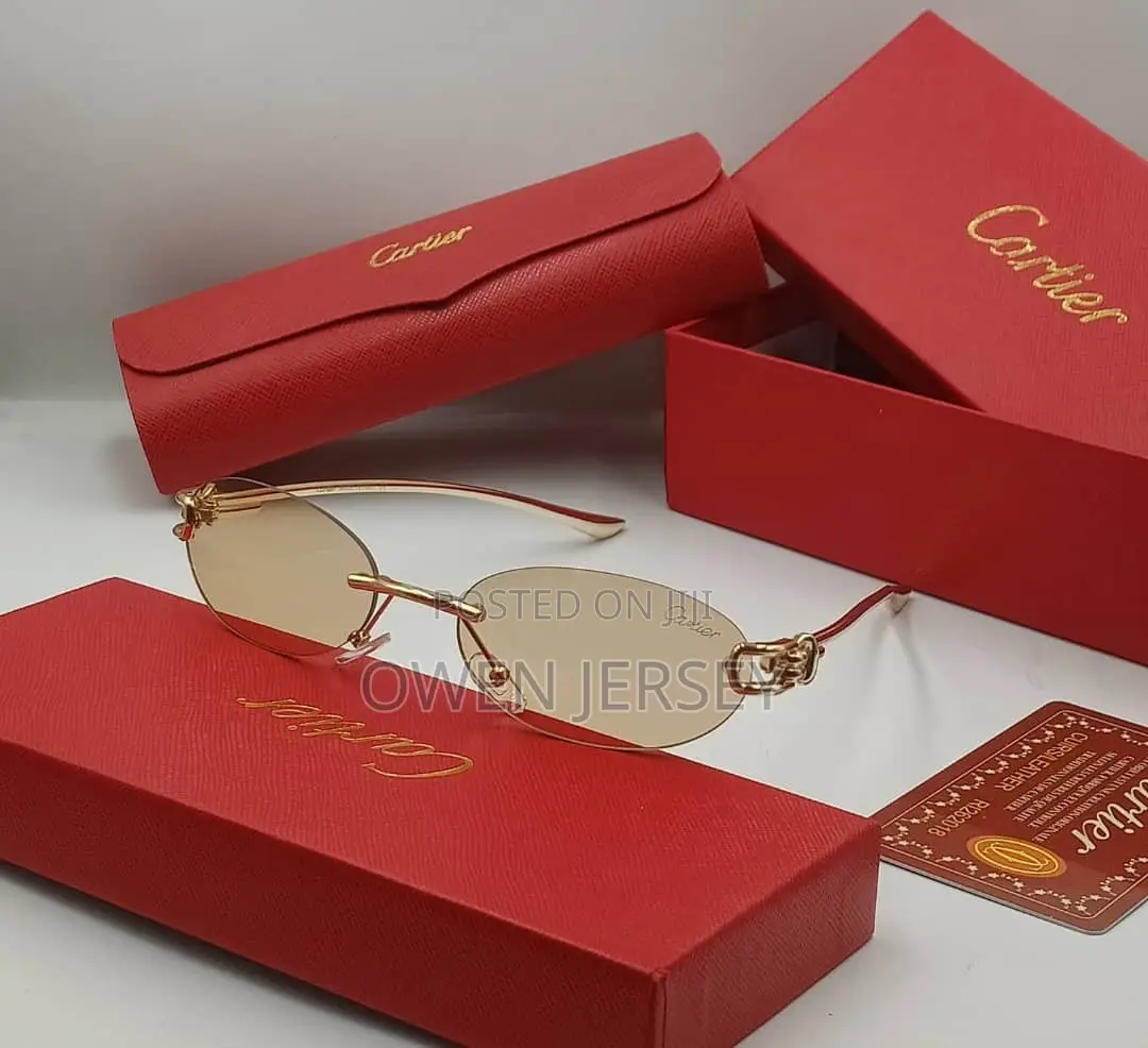 Cartier Rimless Oval Sunglasses – Gold-Tone With Grey Tinted Lenses