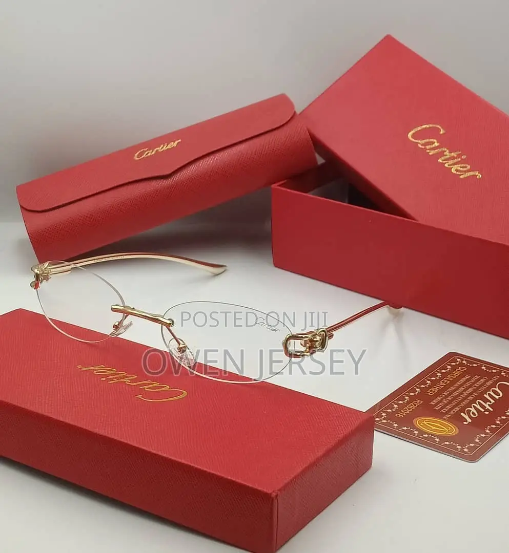 Cartier Rimless Oval Sunglasses – Gold-Tone With Grey Tinted Lenses