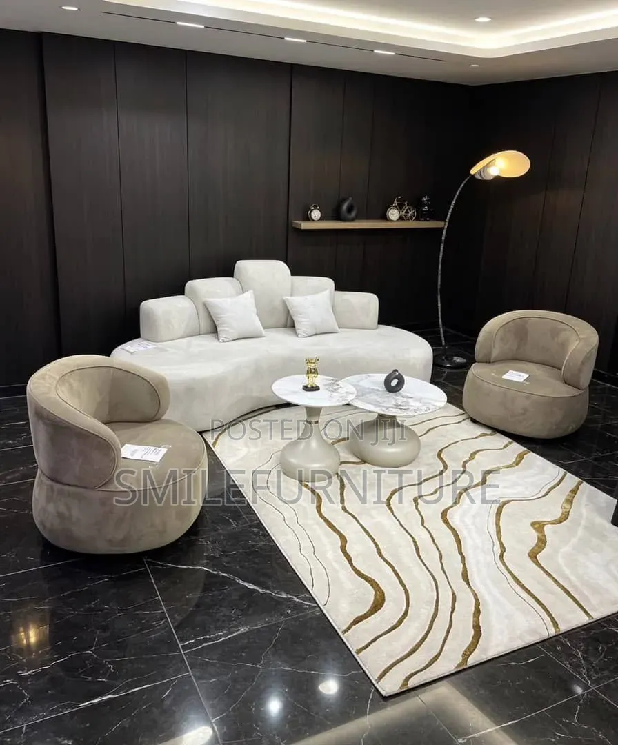A Set of Sofas Chairs And