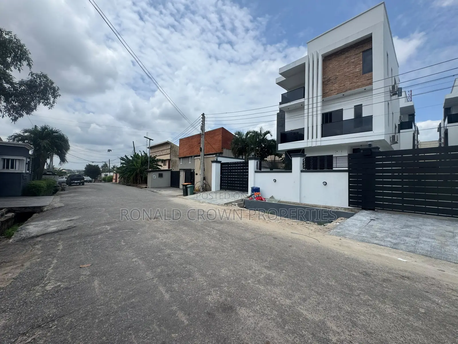 Land Measuring 557sqm With Duplex Structure on It at Ikeja