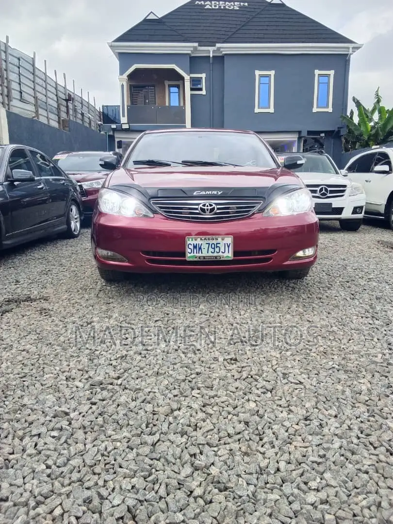 Toyota Camry LE 4dr Sedan (2.4L 4cyl 5M) 2004 Red