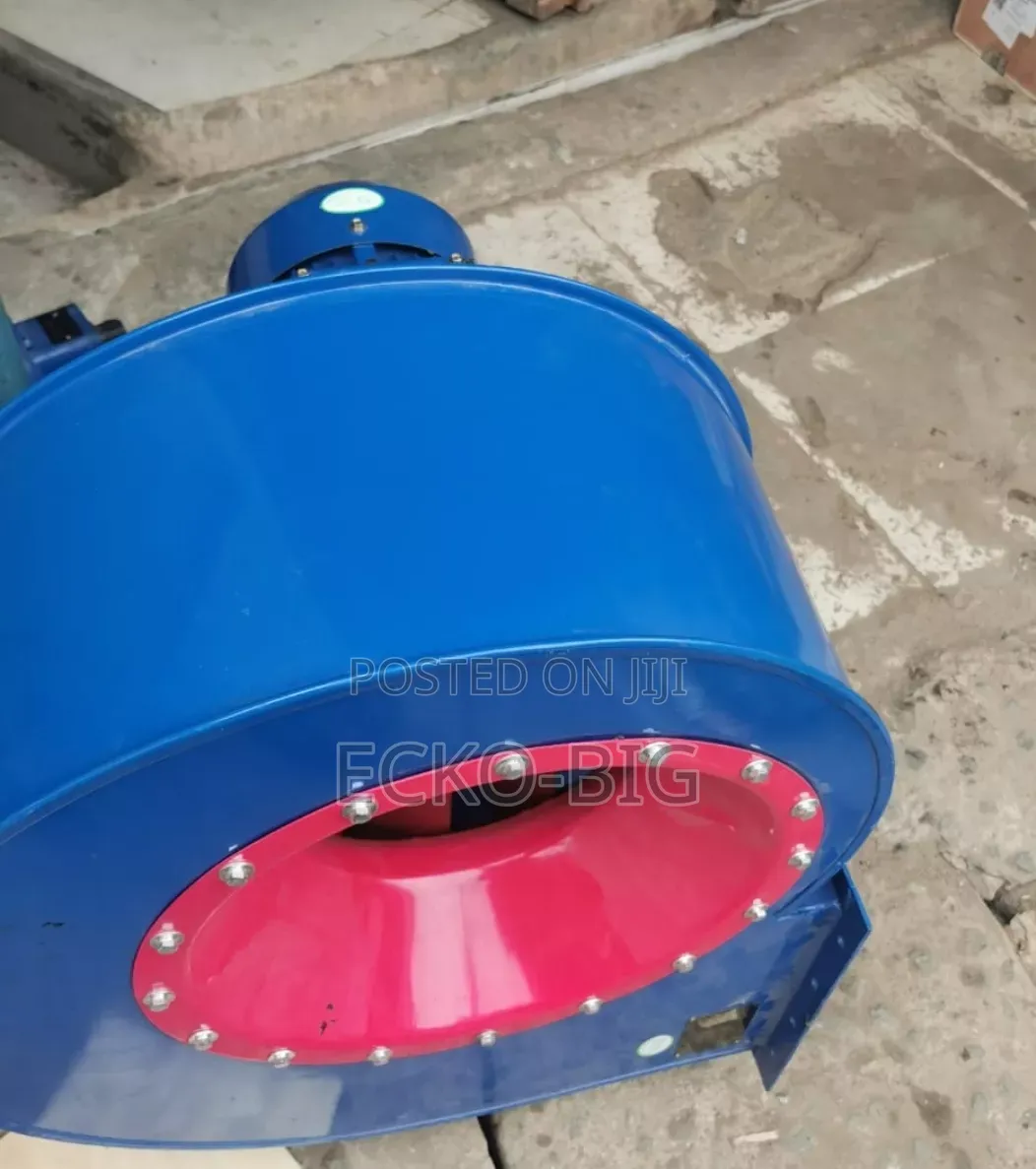 Blue Industrial Centrifugal Fan Blower With a Red Intake Nozzle.