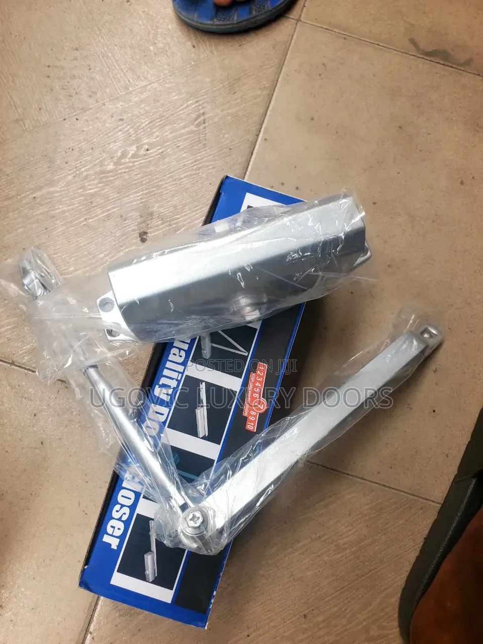 Heavy-Duty Hydraulic Door Closer With Adjustable Arm.