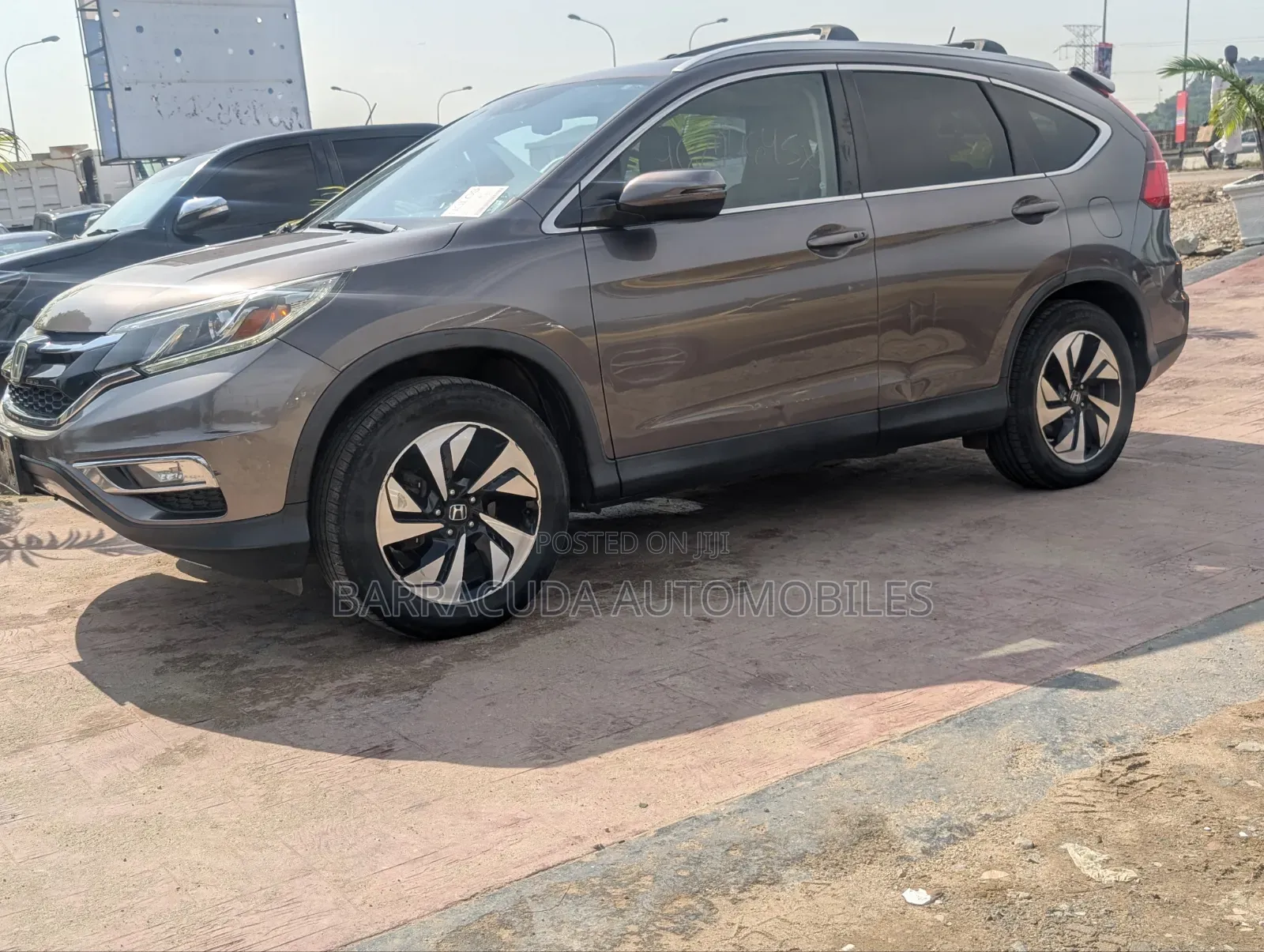 Honda CR-V Touring 4dr SUV AWD (2.4L 4cyl CVT) 2015 Brown