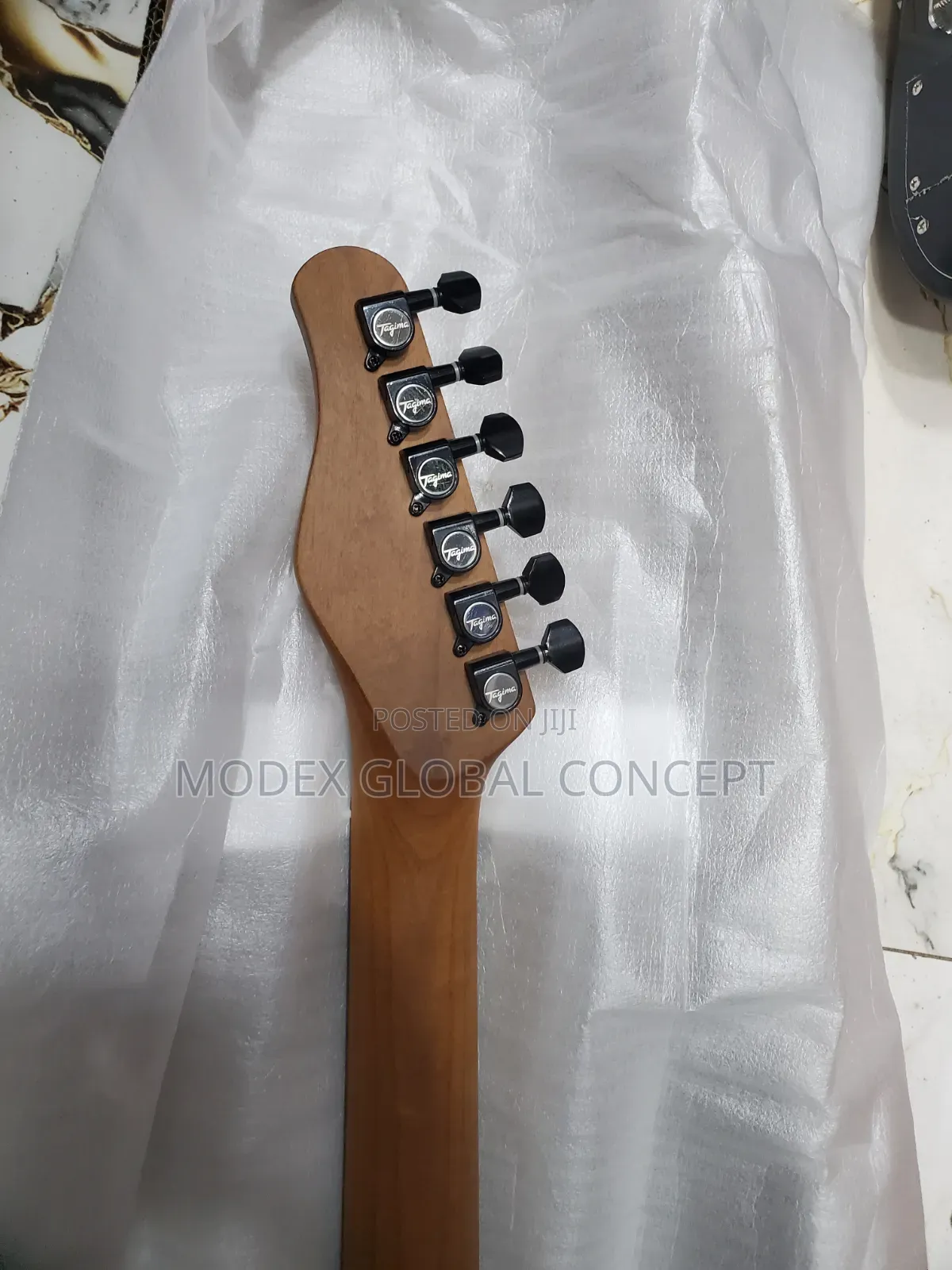 Tagima Tessy NTS Natural Satin Electric Guitar.