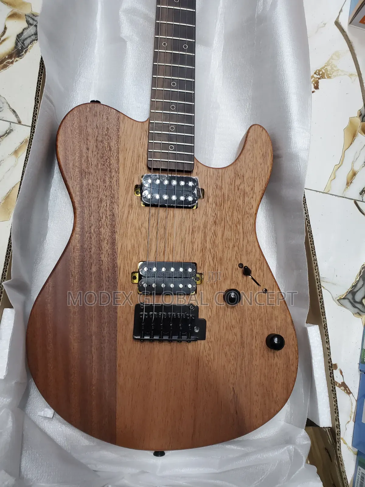 Tagima Tessy NTS Natural Satin Electric Guitar.
