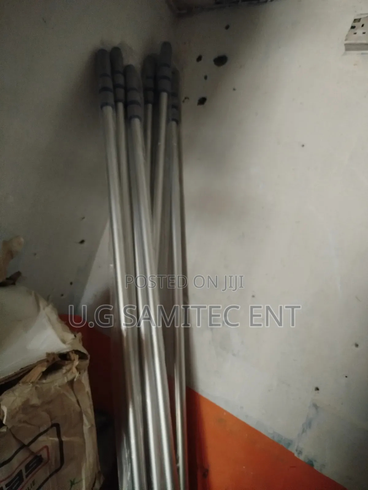 Telescopic Aluminum Extension Poles and the Net