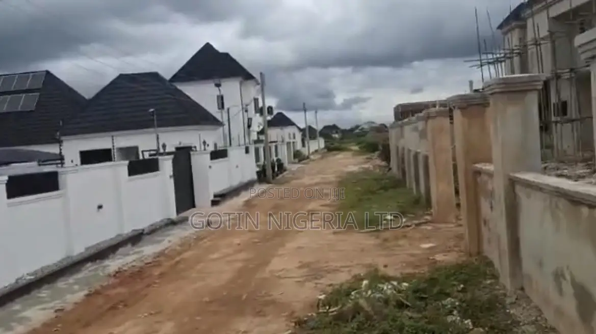 Fenced 100×100ft C of O Land at BIU Estate, Amagba GRA