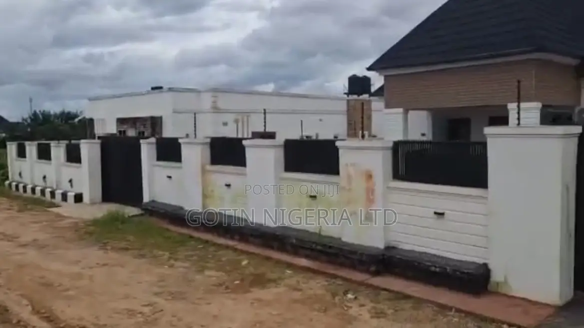 Fenced 100×100ft C of O Land at BIU Estate, Amagba GRA