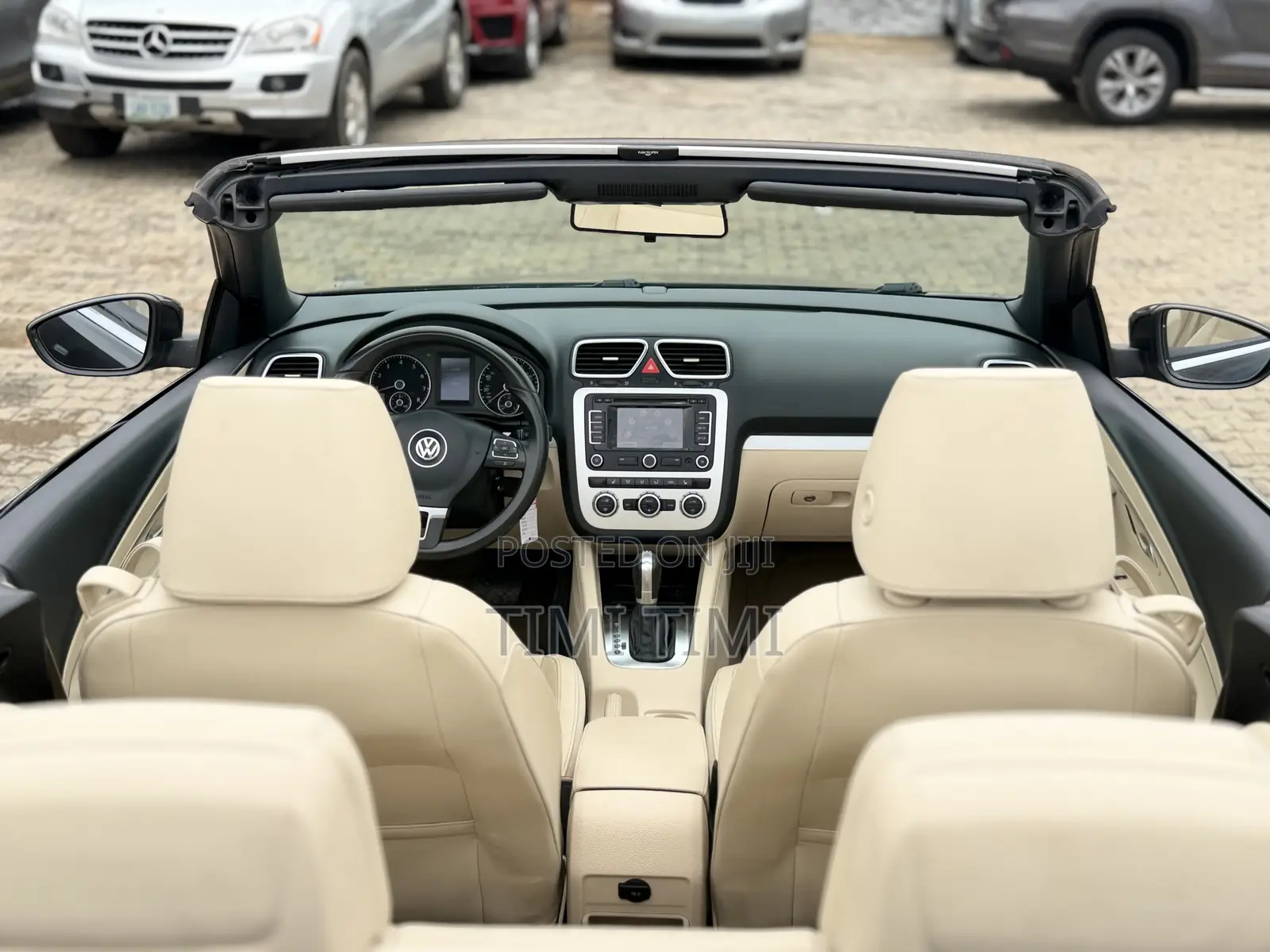 Volkswagen Eos Sport 2dr Convertible (2.0L 4cyl Turbo 6AM) 2014 Brown