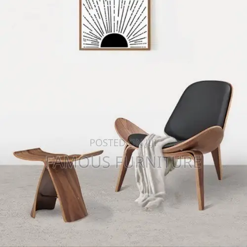 Modern Shell Lounge Chair Featuring a Curved Walnut-Finish Wooden Fram