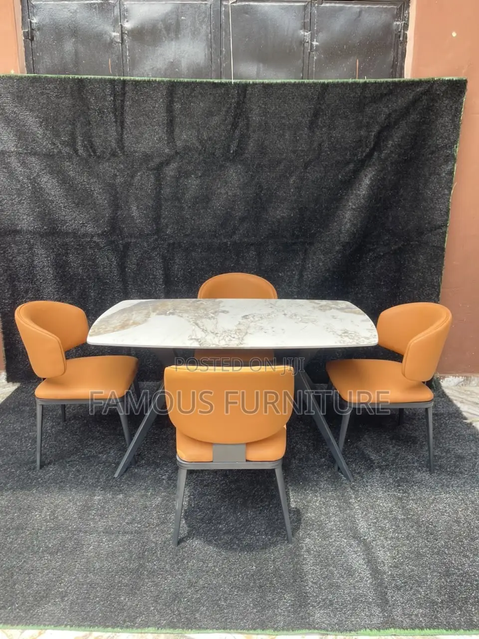 This Is a 4-Seater Dining Set Featuring a Marble-Patterned Table