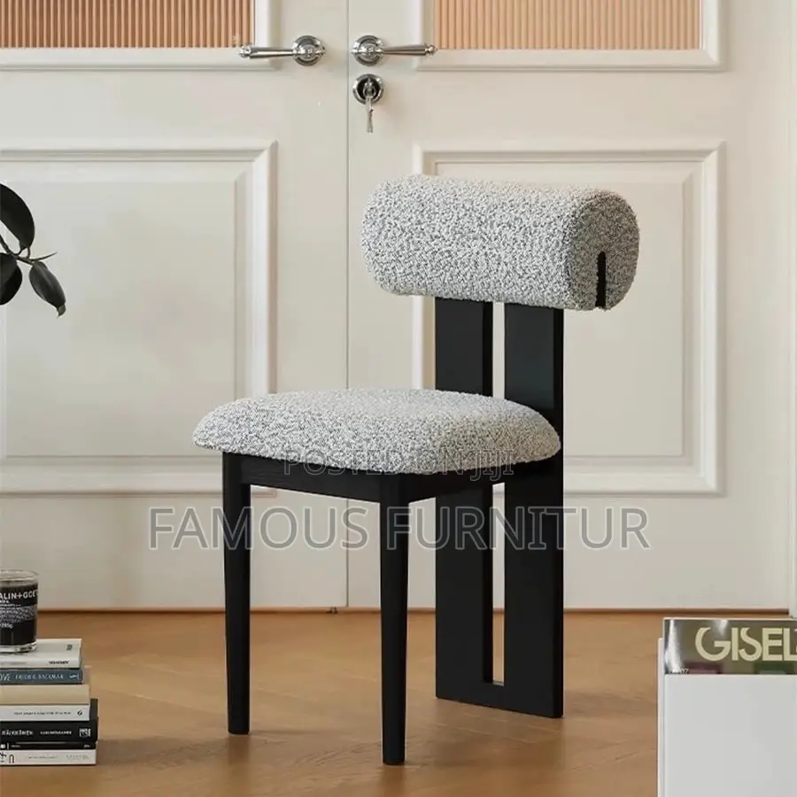 This Contemporary Dining Chair Features a Striking Dark Wood Frame Pai