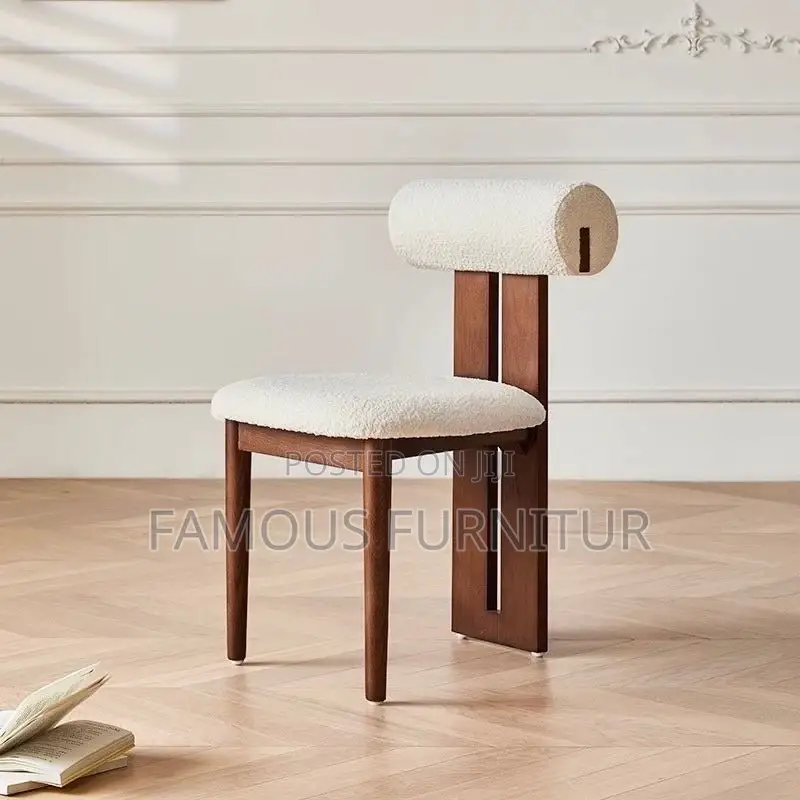 This Contemporary Dining Chair Features a Striking Dark Wood Frame Pai