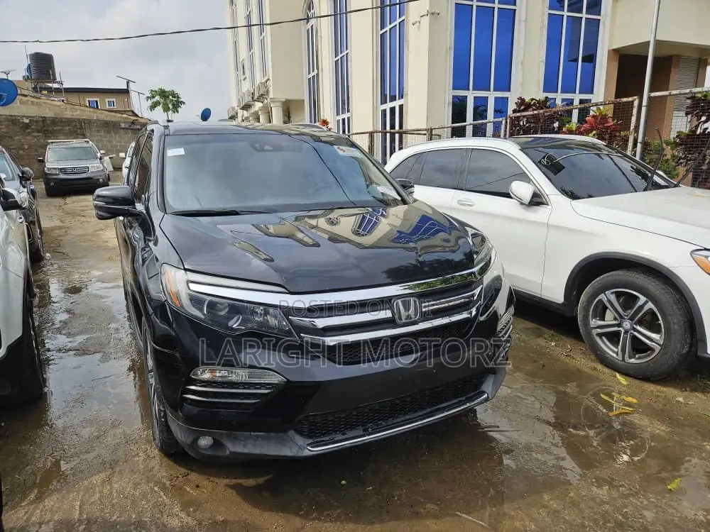 Honda Pilot Touring 4dr SUV 4WD (3.5L 6cyl 9A) 2016 Black