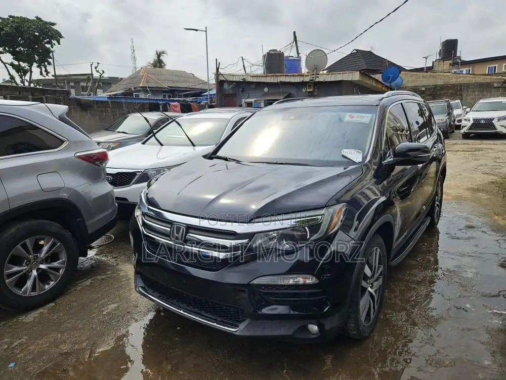 Honda Pilot Touring 4dr SUV 4WD (3.5L 6cyl 9A) 2016 Black