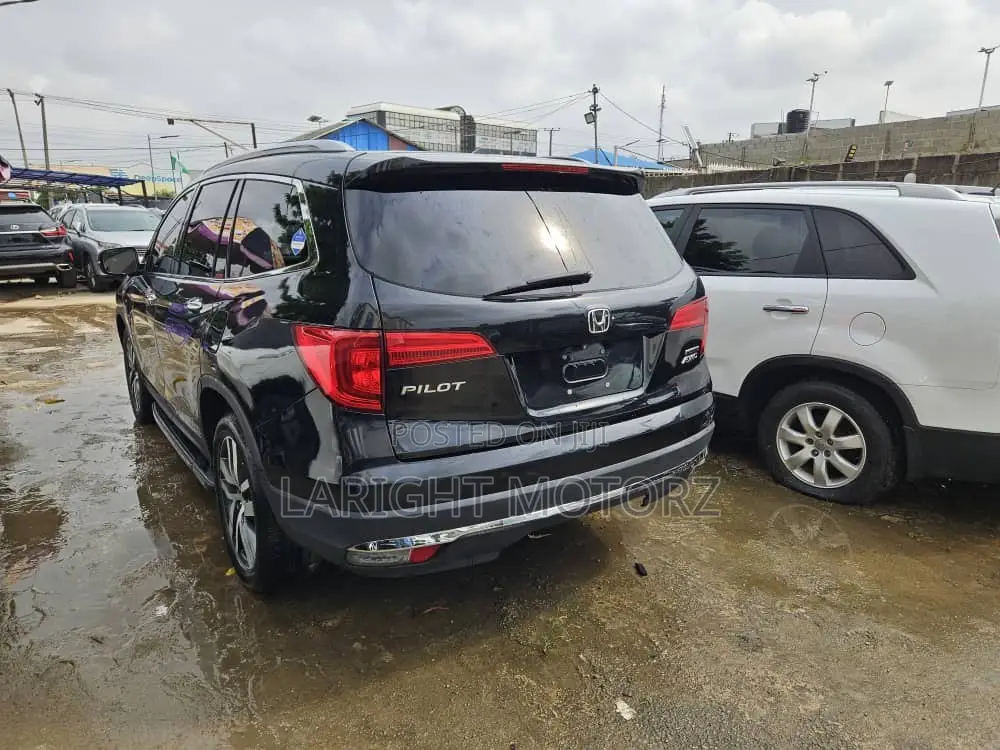 Honda Pilot Touring 4dr SUV 4WD (3.5L 6cyl 9A) 2016 Black