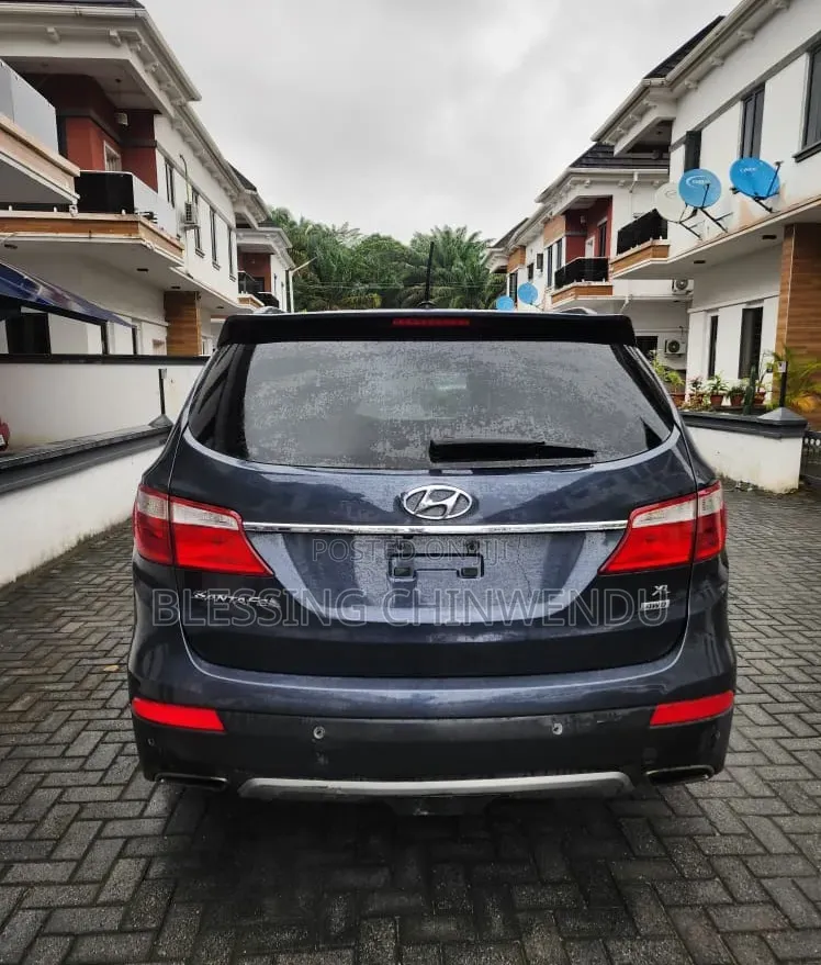 Hyundai Santa Fe Limited w/Saddle Interior 4dr SUV AWD (3.3L 6cyl 6A)